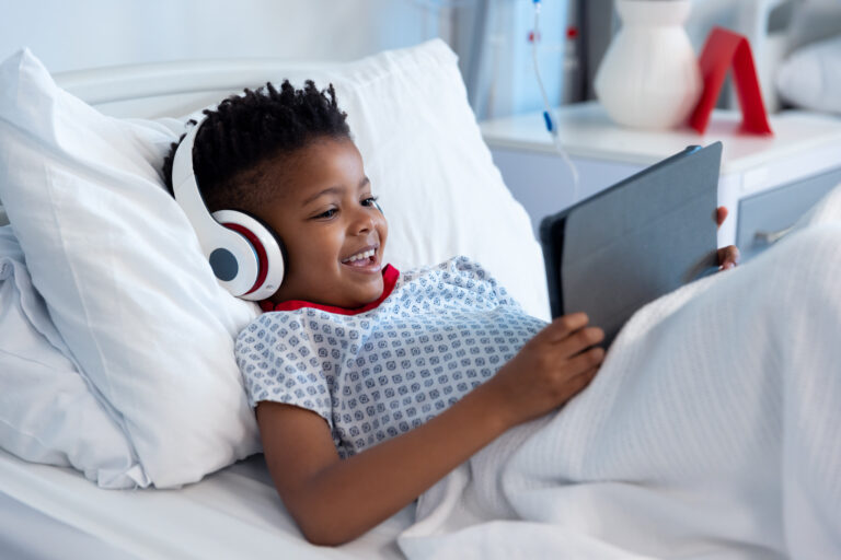 boy with headphones audiobooks for healthcare